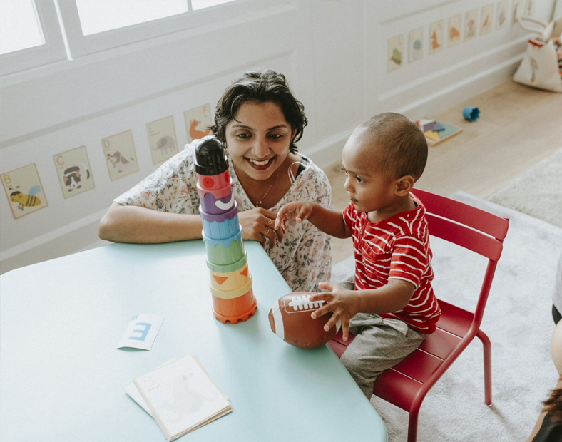 Teacher working with a child